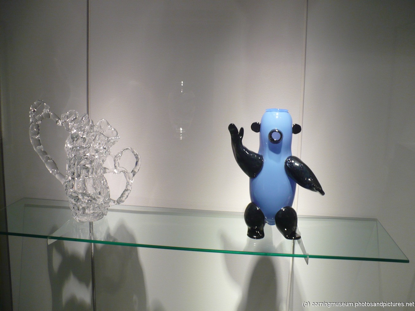 Reconstructed glass pitcher and a ceramic bear at Corning Museum of Glass.jpg
