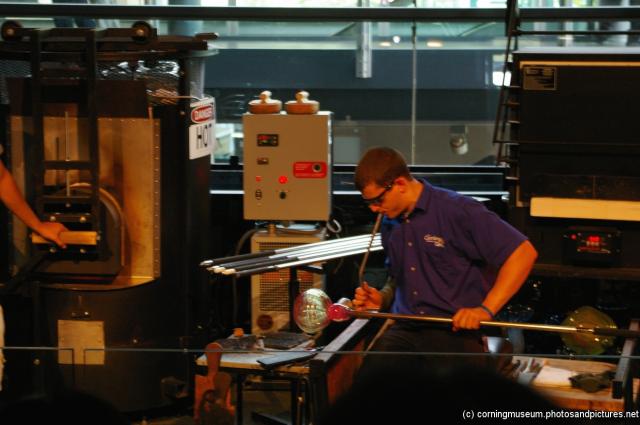 Glassblower at the Corning Museum of Glass Glass-making show.jpg
