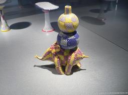 Vase on top of elephant art glass at Corning Museum of Glass.jpg
