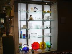 Colorful glass plates and glassware at International Studio glass art works at Corning Museum of Glass.jpg