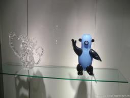 Reconstructed glass pitcher and a ceramic bear at Corning Museum of Glass.jpg