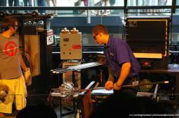 Glassmaker making glass at Corning Museum of Glass show.jpg